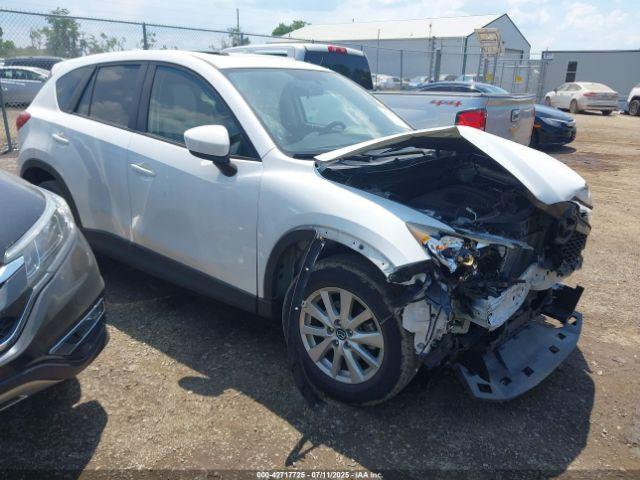  Salvage Mazda Cx